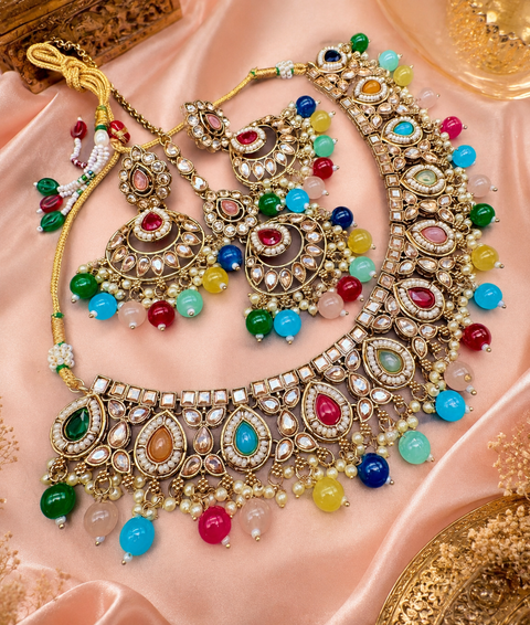 Polki stone with pearls beaded work beautiful necklace with jhumka and tikka set