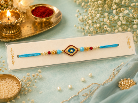 Evil eye Elegant handcrafted Rakhi with premium beads and sparkling stonework, beautifully crafted to celebrate the special bond of love and protection.