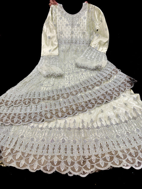 Netting based silver stones and embroidery work all over front & back of kameez with stone work and beautiful lehnga & netting dupatta (Size 44 and can be altered upto 46)