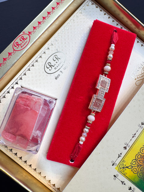 (Video clip attached)AD stone Beautiful Stone Work Rakhi in nice pack gift box with Mishri, Sindoor, Rice, Chandan