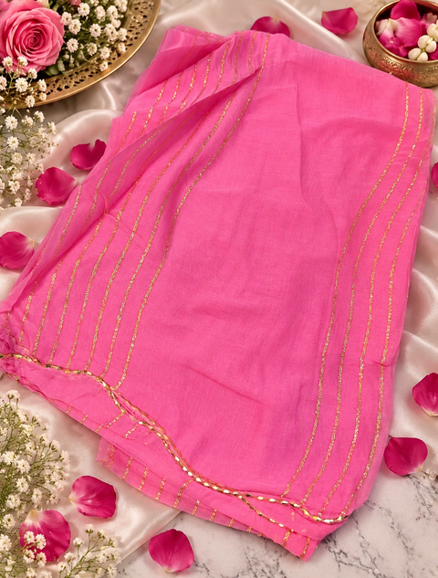 Elegant chiffon dupatta with delicate gold stripe detailing. Lightweight, flowy and perfect for festive or party wear.slight variation in color & design is possible