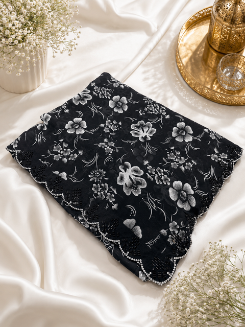Beautiful black Stones work border design beautiful very soft Georgette Saree. The Blouse Worn By The Model Is For Reference Purposes Only. The Blouse Piece Is Attached Separately With The Saree. Slight Variation In Color And Design May Occur.