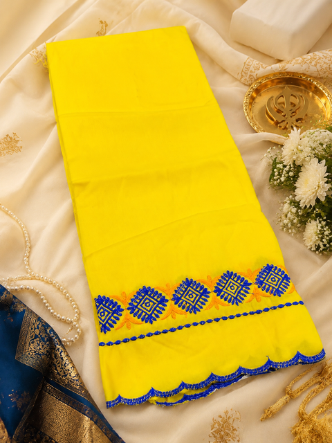 Elegant Hazoori Saropa crafted in rich royal blue fabric, adorned with traditional white and yellow embroidery and a delicate scalloped border.Size (around 216cms lenth / 84 cms wide) (Copy)