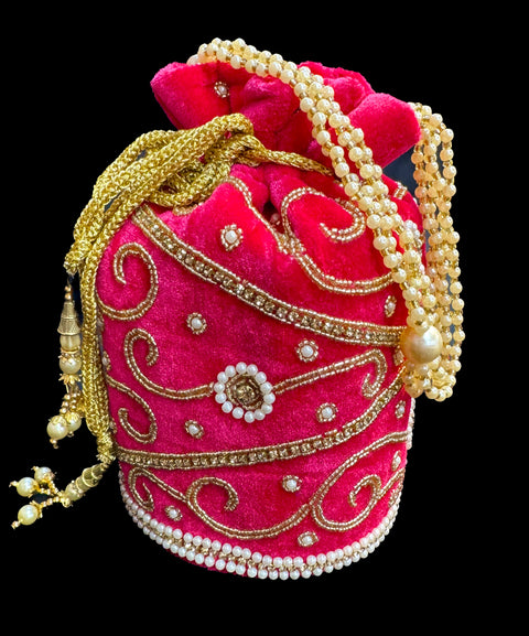 Velvet based Embroidery with stones & pearl work hand bag /potli bag