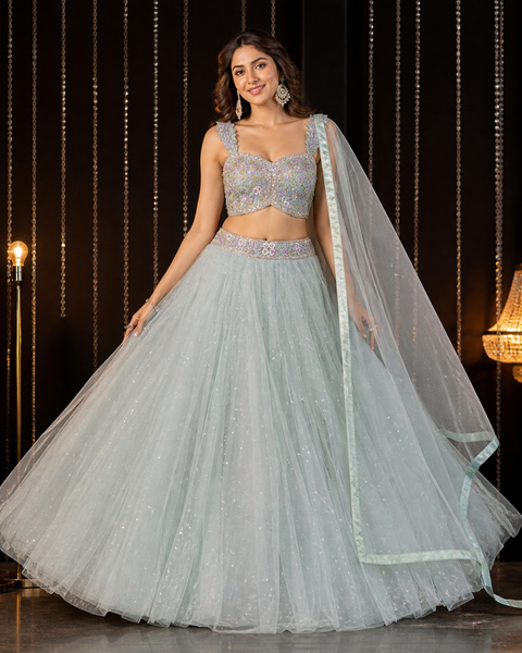 (Video clip attached)Heavy hand work designer stylish Blouse with very very heavy flared shiny netting based  princess style lehnga and dupatta