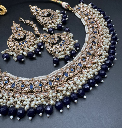 Golden Original Polki stone with pearls beaded heavy work necklace with earrings and tikka set