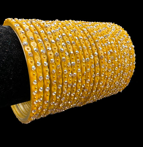 Yellow color Golden jerkan Stone beautiful Glass Bangles (1 Dozen in 1 pack ) Price per pack