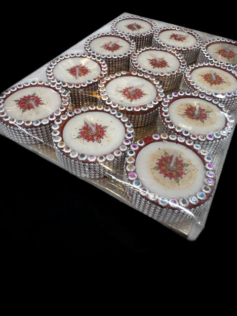 12 piece diya Natural Clay Traditional (Diwali Ke Diye) price per pack (slight variation in colors and design is possible )with wax inside