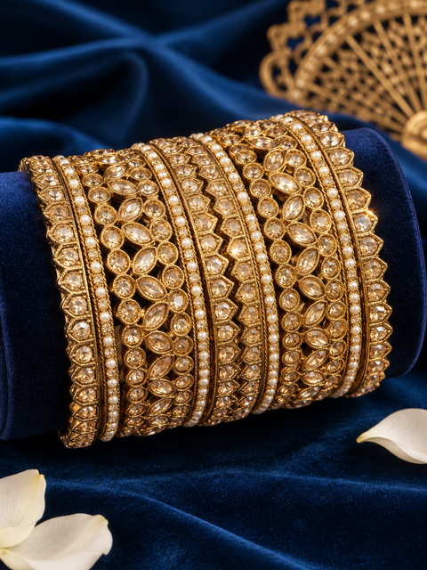 Beautiful bangle set featuring sparkling polki stones (Slight variations in color & design is possible )