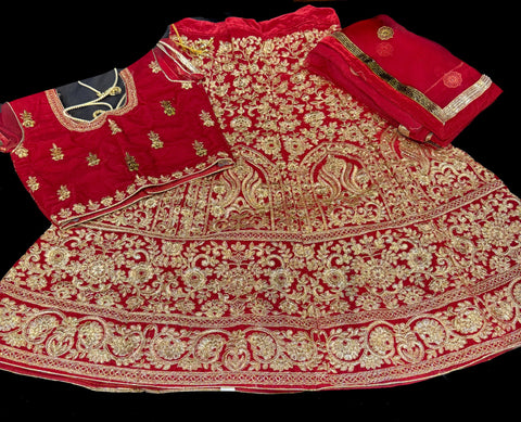 Maroon colour velvet based heavy embroidery work all over on lehnga & blouse with heavy work netting dupatta