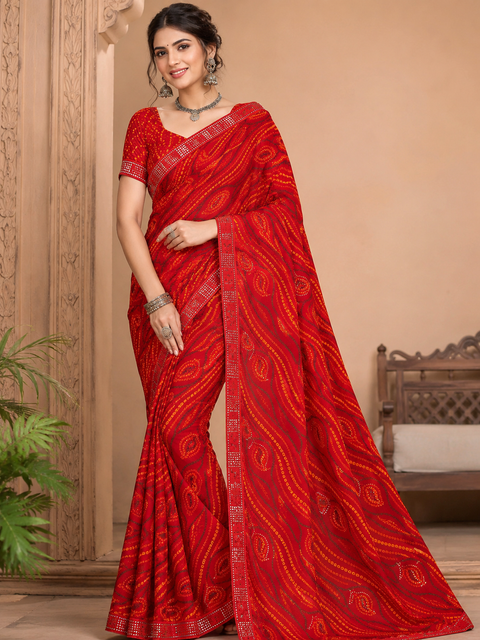 Soft georgette based bandhani print sarees with stones work border. Blouse Worn By The Model Is For Reference Purposes Only. The Blouse Piece Is Attached Separately With The Saree. Slight Variation In Color And Design May occur