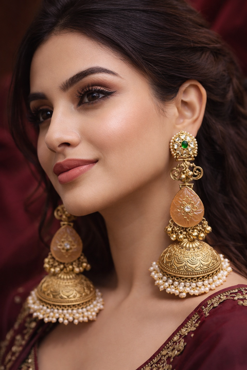 (Video clip attached )Trending Kashmiri Earrings /Elegant traditional jhumka earrings crafted with a high-quality alloy base, featuring intricate antique gold-look detailing, delicate pearl accents , Ghunghrooand a beautifully carved drop stone