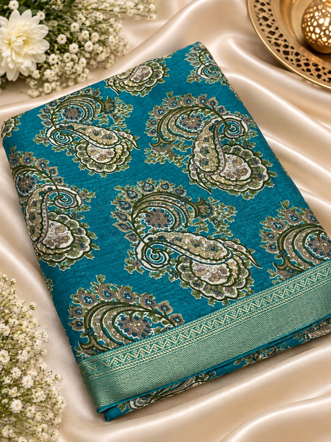 Soft Georgette Printed Saree – Lightweight and flowy with elegant all-over print and border. Matching blouse piece attached; model blouse is for reference only. Slight variation in colour/design is possible.