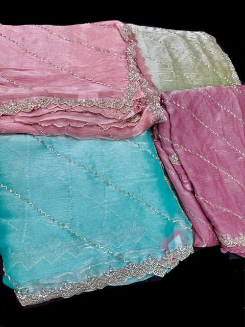 Pastel shades Jimmy Choo base fabric With Beautiful handwork all over on Saree and border