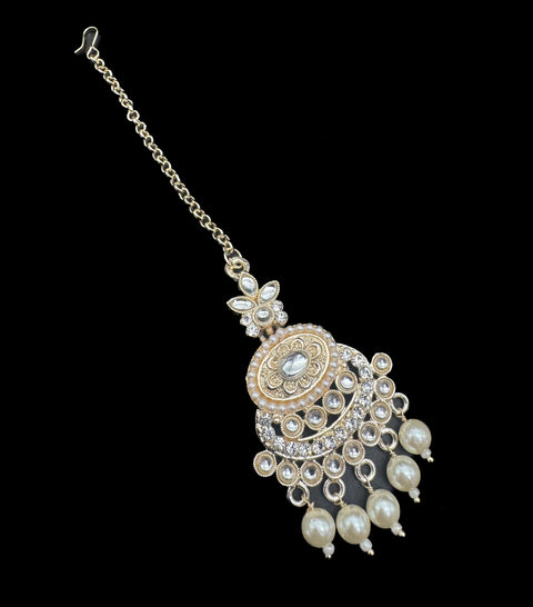 Lite gold color kundan with pearl work beautiful tikka