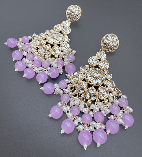 Kundan with beautiful pearls heavy look Earrings with lite weight