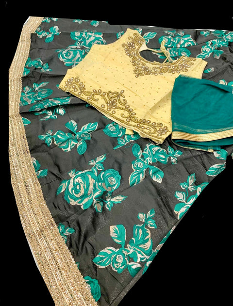 Golden colour silk based stone work blouse with brocade silk lehnga