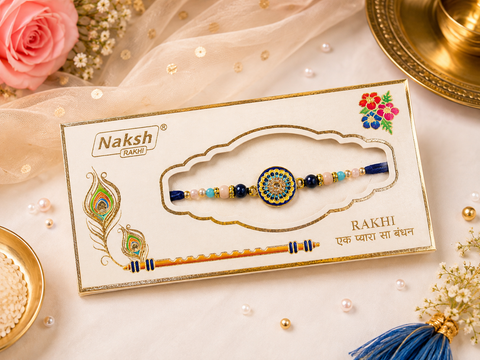 Elegant handcrafted Rakhi with premium beads and sparkling stonework, beautifully crafted to celebrate the special bond of love and protection.