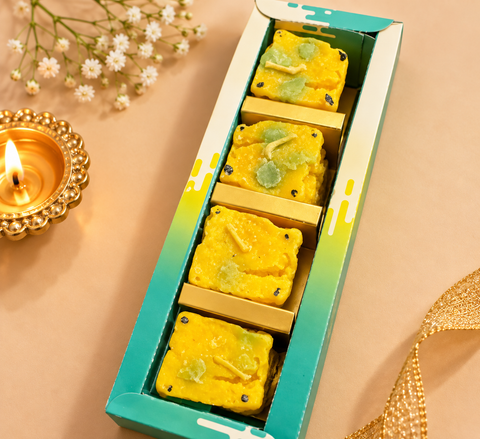 Dhokla -Inspired Candle Set with silver foil-style detailing, perfect for Diwali décor, pooja and gifting. Slight variation in shape or finish may occur.