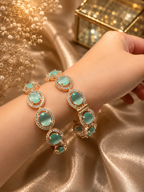 Luxury screw-open rose gold bangles adorned with premium mint crystal stones and sparkling American Diamond accents for timeless elegance(Slight variations in color and design is possible)
