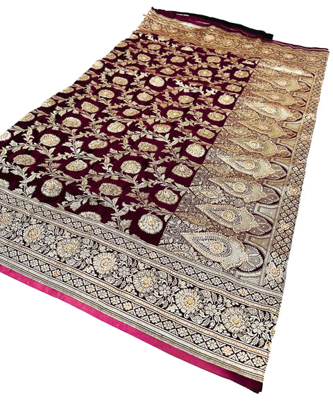 Beautifully designed Banarasi Silk Saree with heavy Handwork with stones & Zari