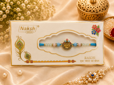 Elegant handcrafted Rakhi with premium beads and sparkling stonework, beautifully crafted to celebrate the special bond of love and protection.