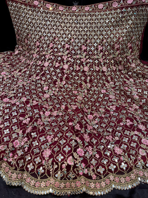 Deep Maroon colour netting based heavy embroidery jaal with mirror work multiflared beautiful bridal lehnga