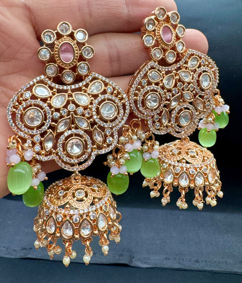 (video clip attached)Pastel Pink & Mint color Original American Diamond stones with Polki & pearls studded very Heavy work necklace with beautiful Jhumka, tikka NOTE:- original AD & Polki stones not fake plastic stones)