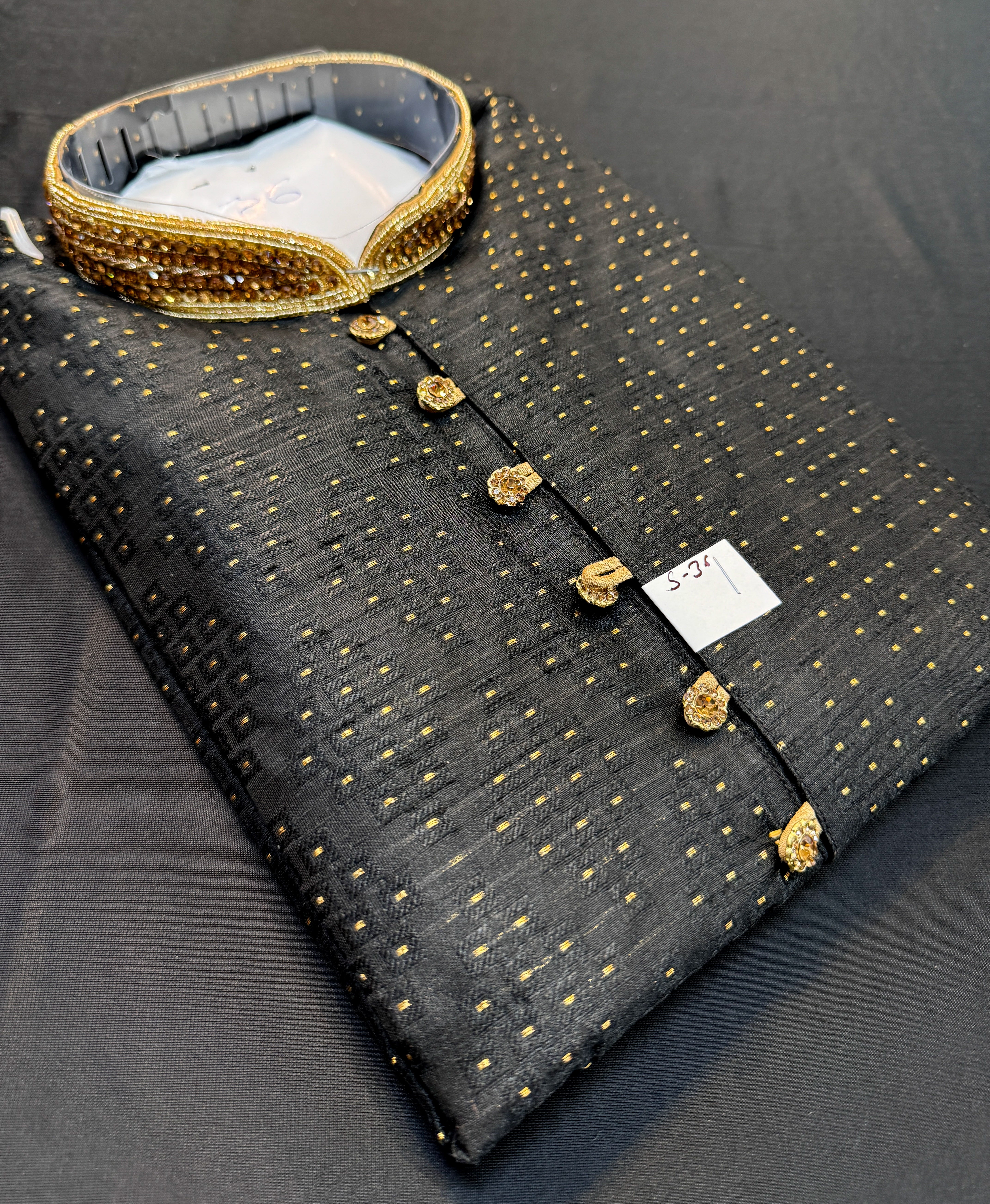 Soft Silk based Heavy brocade work with stone work buttons and neck de ...