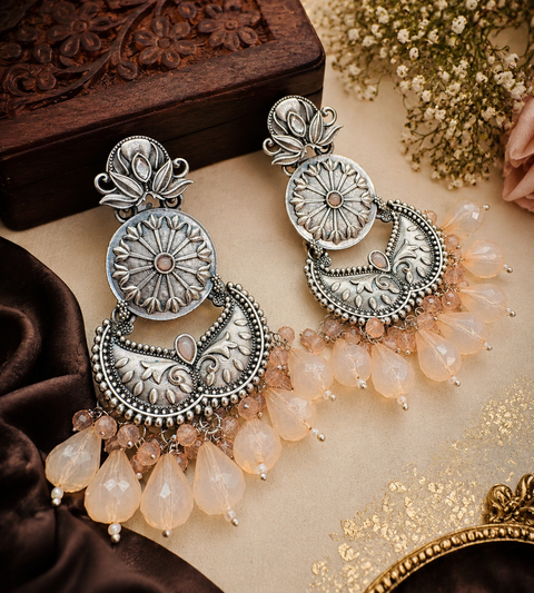 Beautiful oxidised earrings with colourful pearls ( slight variations in color and design is possible)