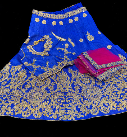 Royal blue colour silk based heavy embroidered lehnga  with magenta dupatta
