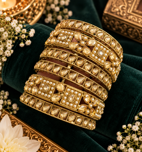 Beautiful bangle set featuring sparkling polki stones (Slight variations in color & design is possible )