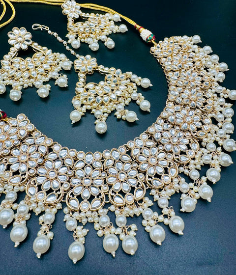 Kundan studded & pearls work designer heavy work Necklace set with beautiful Earrings & Tikka