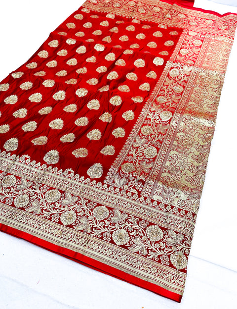 Beautifully designed Banarasi Silk Saree with heavy Handwork with stones & Zari