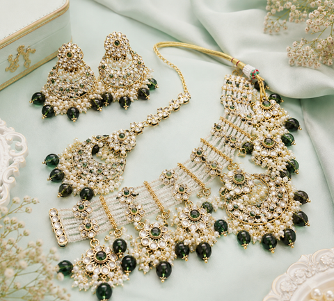 Kundan work beautiful heavy work necklace with designer Jhumka Earrings and Tikka Set featuring delicate pearl detailing and timeless royal charm (slight variation in color and design is possible)