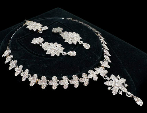 Silver color Jerkan stone studded beautiful necklace set with Earrings & Tikka