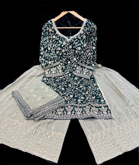 Georgette based sequined and embroidery work kameez with sharara pants and netting dupatta