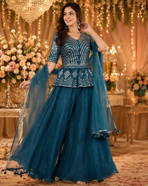 Georgette based handwork with Stones design beautiful flared Kameez with georgette Sharara and netting Dupatta (slight variation in color and design is possible)