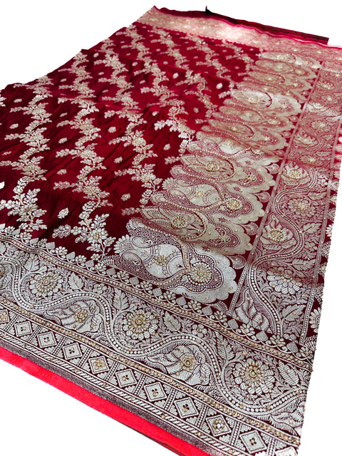 Beautifully designed Banarasi Silk Saree with heavy Handwork with stones & Zari