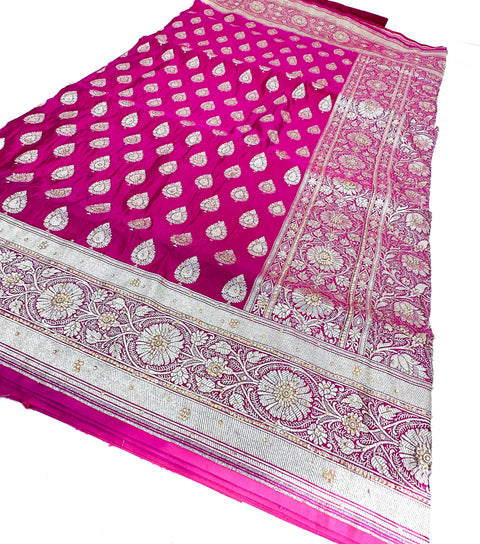 Beautifully designed Banarasi Silk Saree with heavy Handwork with stones & Zari