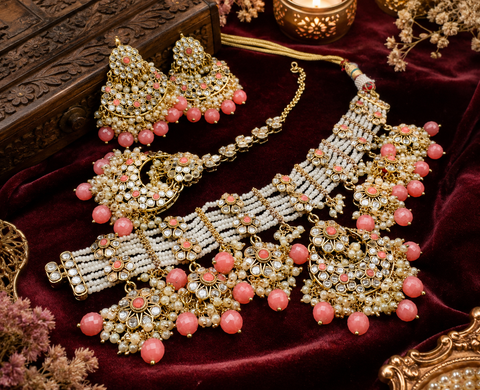 Kundan work beautiful heavy work necklace with designer Jhumka Earrings and Tikka Set featuring delicate pearl detailing and timeless royal charm (slight variation in color and design is possible)