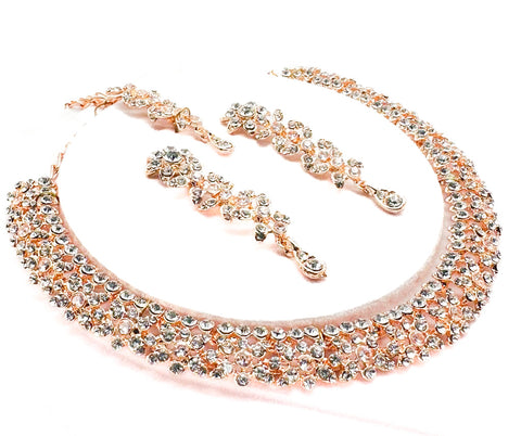Rose gold color Jerkan stone studded beautiful necklace set with Earrings & Tikka