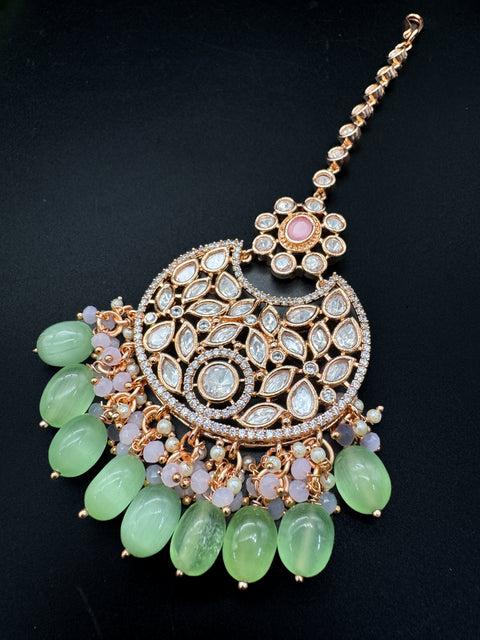 (video clip attached)Pastel Pink & Mint color Original American Diamond stones with Polki & pearls studded very Heavy work necklace with beautiful Jhumka, tikka NOTE:- original AD & Polki stones not fake plastic stones)
