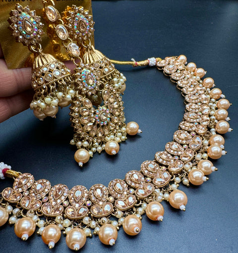 Polki stones & Jerkan stone with pearls beaded work beautiful necklace with earrings and tikka set