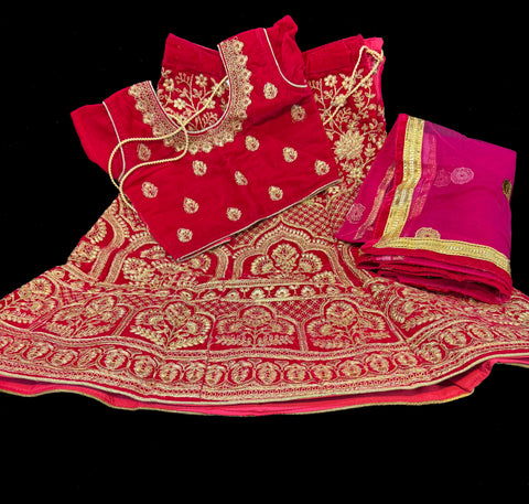 Mazenta colour velvet based heavy embroidery work all over on lehnga & blouse with heavy work netting dupatta