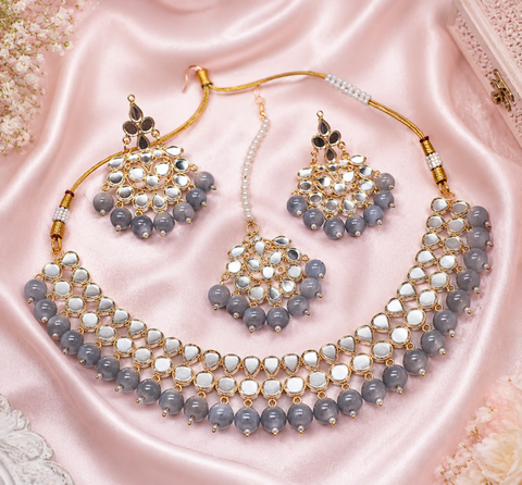 Elegant mirror necklace set adorned with beads and pearl detailing, perfect for adding a royal touch to your traditional look
 ( slight variation in color and design is possible )