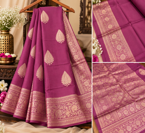 Luxuriously soft silk saree with a smooth, lightweight feel and beautifully flowy drape. Featuring rich woven zari floral motifs and an elegant detailed border .Blouse piece included. Slight variation in colour and design is possible.