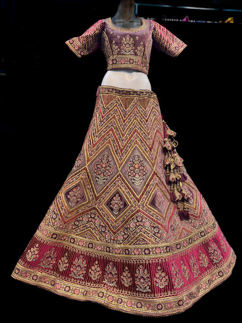 (Video clip attached)size42(upto 46)Pastel Purple mauve shade velvet based heavy embroidery & gotta patti work with golden stone & maroon with pink Mint colour flower design very heavy super big flared heavy ken designer Bridal Lehnga with bigger tessels