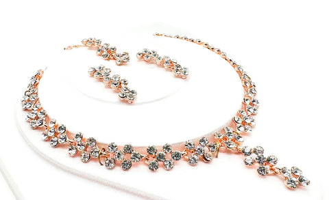 Rose gold color Jerkan stone studded beautiful necklace set with Earrings & Tikka