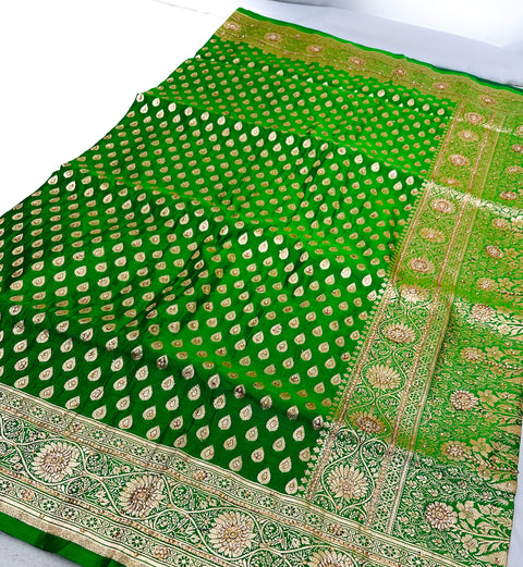 Beautifully designed Banarasi Silk Saree with heavy Handwork with stones & Zari